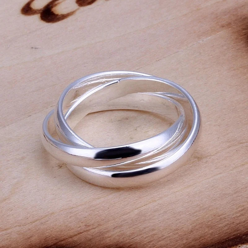 INTERTWINED TRINITY SILVER RING