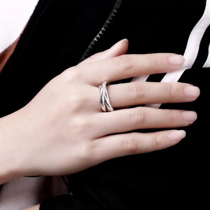INTERTWINED TRINITY SILVER RING
